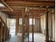 A gutted kitchen under construction, showing framework and plumbing at 1151 Rue Des Chateaux, St Petersburg, FL 33707