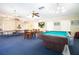 Community recreation room with pool table and ping pong at 1151 Rue Des Chateaux, St Petersburg, FL 33707