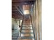Unfinished wood staircase under construction in a new home at 1151 Rue Des Chateaux, St Petersburg, FL 33707