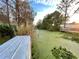 Peaceful canal view with lush vegetation and a private dock at 1218 Vinetree Dr, Brandon, FL 33510