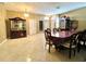 Spacious dining room features a large table and cabinet at 1218 Vinetree Dr, Brandon, FL 33510