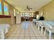 Bright kitchen with ample counter space, white cabinets and refrigerator at 1218 Vinetree Dr, Brandon, FL 33510