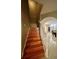 Wooden staircase leading to upper level at 1218 Vinetree Dr, Brandon, FL 33510