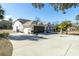 Home's exterior showcasing garage and driveway at 16216 Heron Hills Dr, Spring Hill, FL 34610