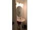 Clean bathroom with pedestal sink and mirror at 16843 Forge Surf St, Land O Lakes, FL 34638