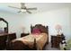 Spacious Primary bedroom with a large bed and plenty of storage at 16843 Forge Surf St, Land O Lakes, FL 34638