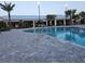 Resort-style pool with a large deck and plenty of seating at 16843 Forge Surf St, Land O Lakes, FL 34638