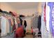 Large walk-in closet with ample shelving and hanging space at 16843 Forge Surf St, Land O Lakes, FL 34638