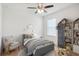 Bedroom with soft color palette, day bed, and cute decor at 16949 Secret Meadow Dr, Odessa, FL 33556