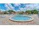 Relaxing pool and spa area with lounge chairs at 2300 Shelly Dr # C, Palm Harbor, FL 34684