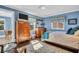 Serene bedroom with light blue walls and wooden furniture at 2528 3Rd N Ave, St Petersburg, FL 33713