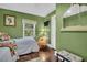 Cozy bedroom with hardwood floors and twin bed at 2528 3Rd N Ave, St Petersburg, FL 33713