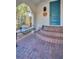 Front porch with a swing and brick steps at 2528 3Rd N Ave, St Petersburg, FL 33713