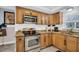 Updated kitchen with stainless steel appliances and light wood cabinets at 2528 3Rd N Ave, St Petersburg, FL 33713
