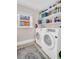 Laundry room with washer, dryer, and shelving for storage at 2528 3Rd N Ave, St Petersburg, FL 33713