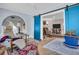 Sunroom with blue doors opening to living room at 2528 3Rd N Ave, St Petersburg, FL 33713