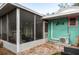 Screened porch and patio area with AC unit at 2600 46Th S St, Gulfport, FL 33711
