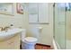 Clean bathroom with a shower/tub combo and updated vanity at 2600 46Th S St, Gulfport, FL 33711