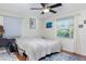 Cozy bedroom with a double bed and ceiling fan at 2600 46Th S St, Gulfport, FL 33711