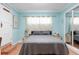 Bedroom with a full-size bed, nightstands and mirrored closet at 2600 46Th S St, Gulfport, FL 33711
