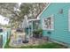 Charming front patio with table and chairs, inviting and relaxing at 2600 46Th S St, Gulfport, FL 33711