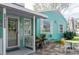 Front porch with teal exterior and plants at 2600 46Th S St, Gulfport, FL 33711