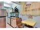 Small galley kitchen with refrigerator and microwave at 2600 46Th S St, Gulfport, FL 33711
