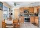 Well-equipped kitchen with stainless steel appliances at 2600 46Th S St, Gulfport, FL 33711