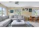 Bright living room with comfy sectional sofa and dining area at 2600 46Th S St, Gulfport, FL 33711