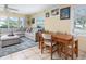 Living room with sectional sofa and dining table at 2600 46Th S St, Gulfport, FL 33711