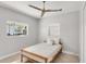 Small bedroom with full bed and wood frame at 2740 E Vina Del Mar Blvd, St Pete Beach, FL 33706