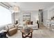 Living room with neutral decor, comfortable seating and large window at 2740 E Vina Del Mar Blvd, St Pete Beach, FL 33706