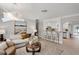 Bright living room with modern decor and an open layout to the kitchen at 2740 E Vina Del Mar Blvd, St Pete Beach, FL 33706
