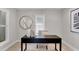 Bright home office with a desk and window at 2740 E Vina Del Mar Blvd, St Pete Beach, FL 33706