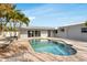 Relaxing kidney shaped pool with brick patio at 2740 E Vina Del Mar Blvd, St Pete Beach, FL 33706