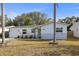 Charming single story home with landscaped yard at 306 Scott Ct, Palm Harbor, FL 34684