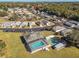 Aerial view showing home, community pool, and recreational areas at 37443 Blueberry Ct, Zephyrhills, FL 33542