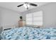 Bedroom with double bed and wicker furniture at 4526 101St N Ave, Pinellas Park, FL 33782