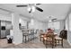 Open concept dining area with kitchen island and table at 4526 101St N Ave, Pinellas Park, FL 33782