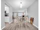 Open concept dining area with view to living room and kitchen at 4526 101St N Ave, Pinellas Park, FL 33782