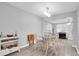 Dining area with a glass-top table and wicker chairs at 4526 101St N Ave, Pinellas Park, FL 33782