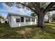 White single story home with mature landscaping at 4526 101St N Ave, Pinellas Park, FL 33782