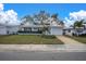 White ranch home with green landscaping and driveway at 4526 101St N Ave, Pinellas Park, FL 33782