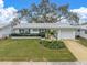 Charming ranch-style home with well-manicured lawn at 4526 101St N Ave, Pinellas Park, FL 33782