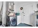 Convenient laundry room with washer, dryer, and extra storage at 4526 101St N Ave, Pinellas Park, FL 33782