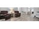 Spacious living room with hardwood floors and comfortable seating at 4526 101St N Ave, Pinellas Park, FL 33782