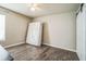 Bedroom with wood-look floors and new mattress at 4709 Red Warbler Ln, Valrico, FL 33596