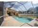 Refreshing screened pool with backyard access and patio at 4709 Red Warbler Ln, Valrico, FL 33596