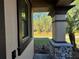 Two-story house with a view of the backyard at 4899 Isola Ct, Wesley Chapel, FL 33543