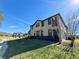 Two-story house with a large backyard at 4899 Isola Ct, Wesley Chapel, FL 33543